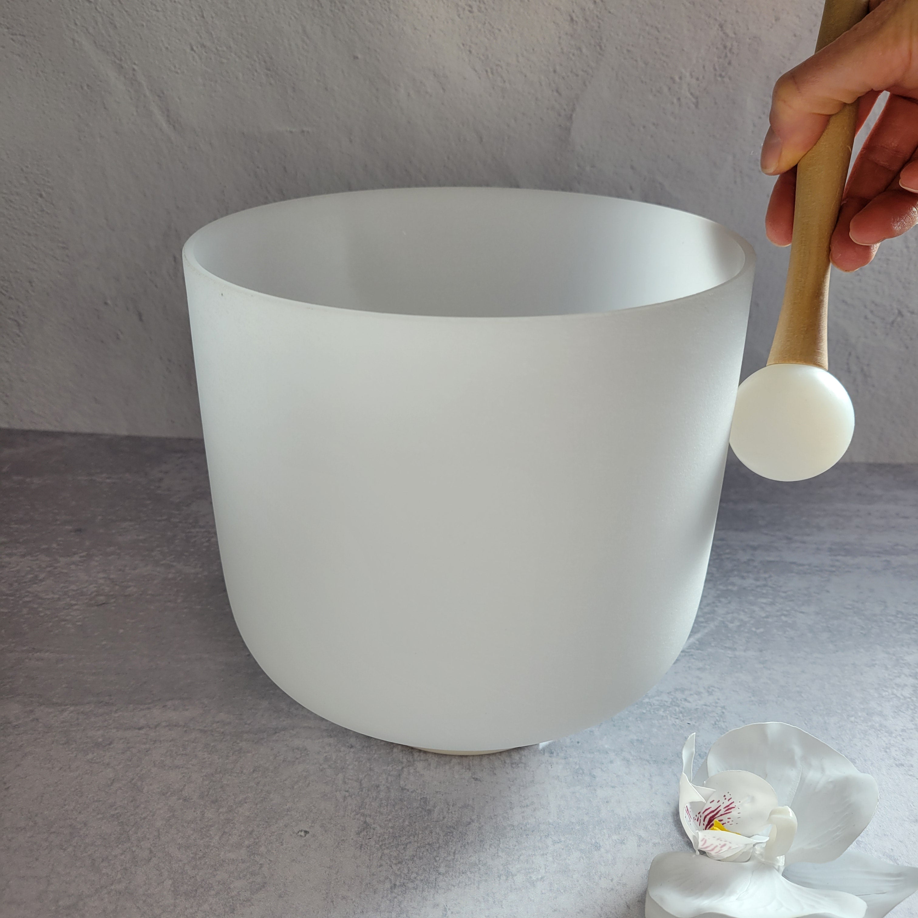 Playing Crystal Singing Bowl