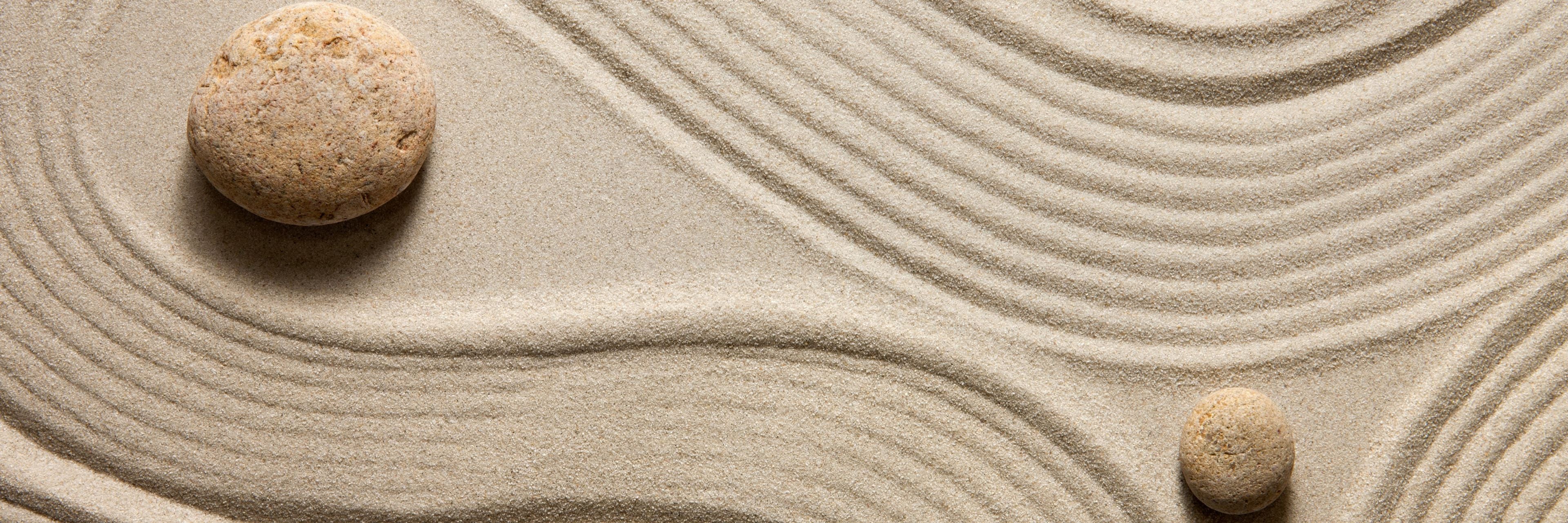 Ripples of Sound in Sand with Zen Garden Stones
