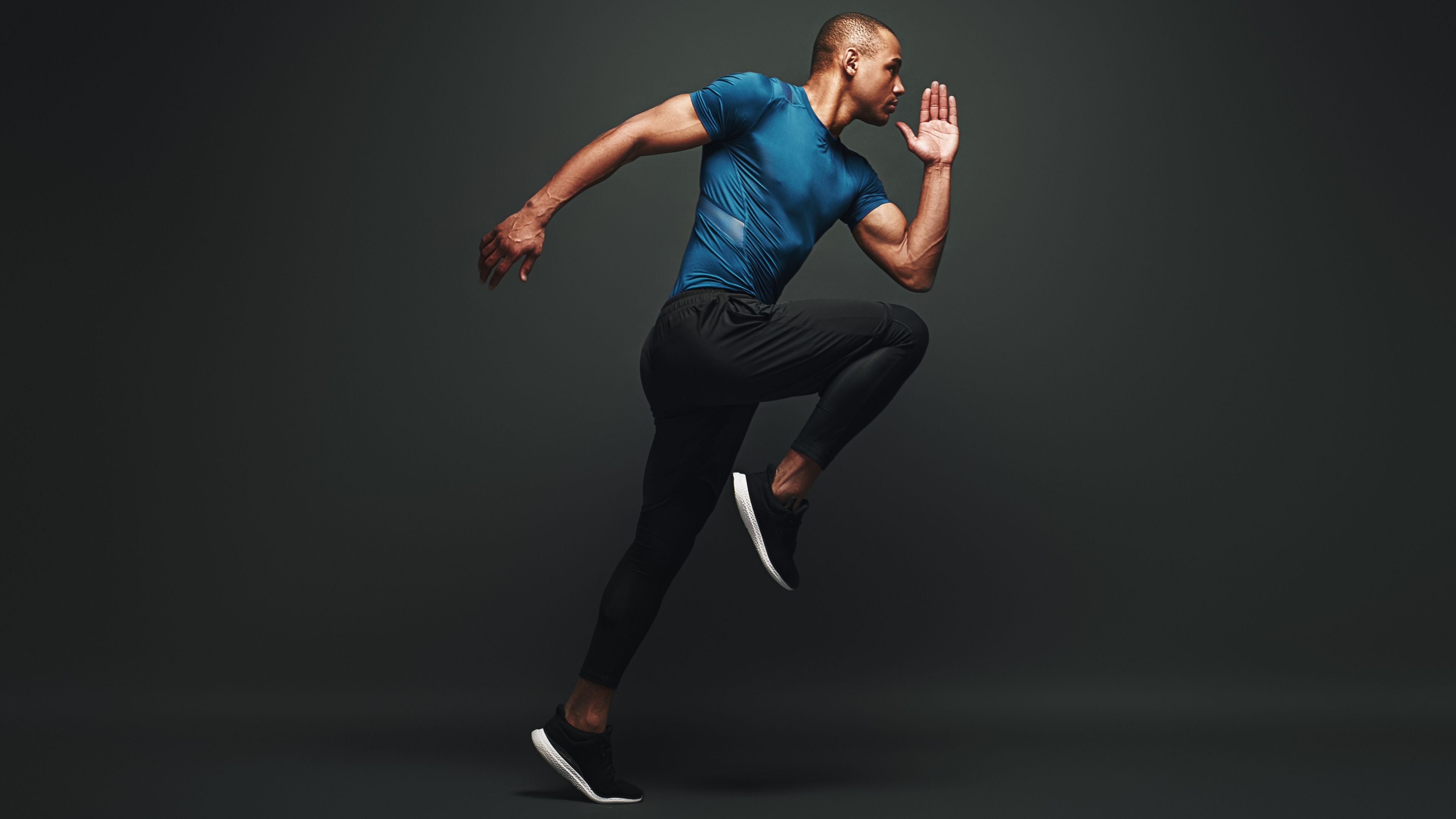 Fit male athlete sprinting