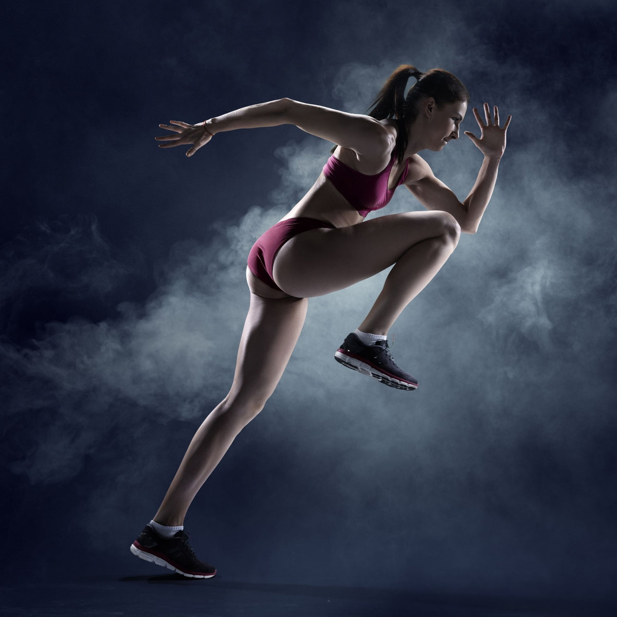 Athletic performance is accelerated with guided meditation image of sprinter running through fog.