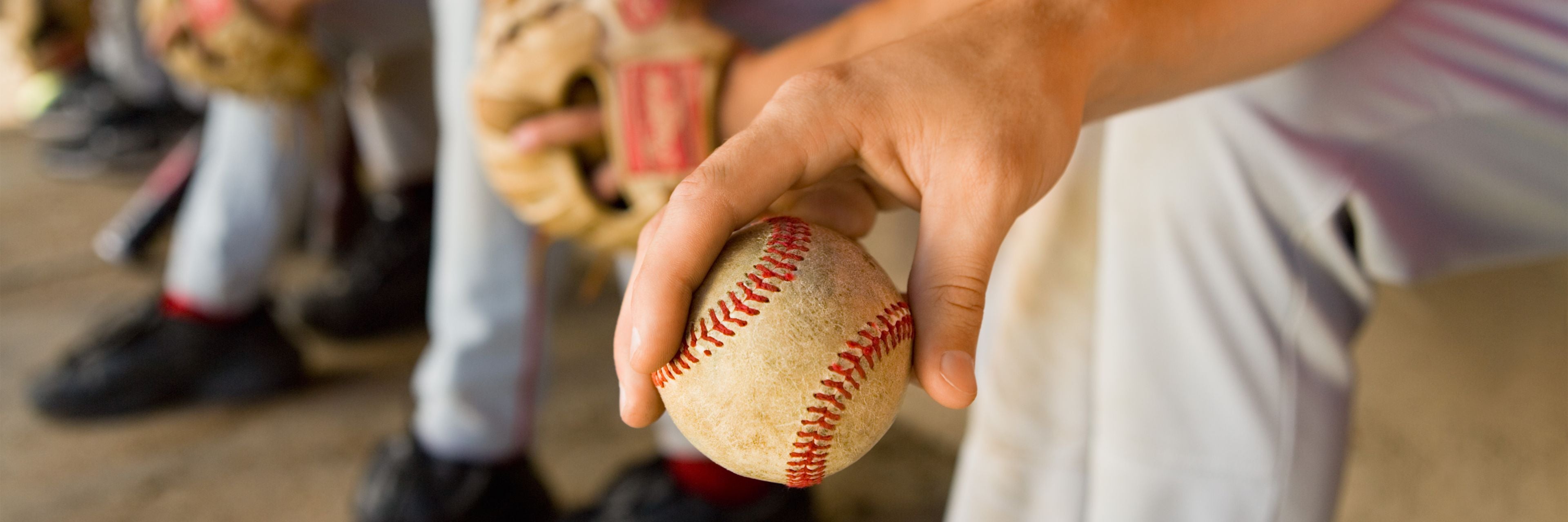 Baseball players in dugout
