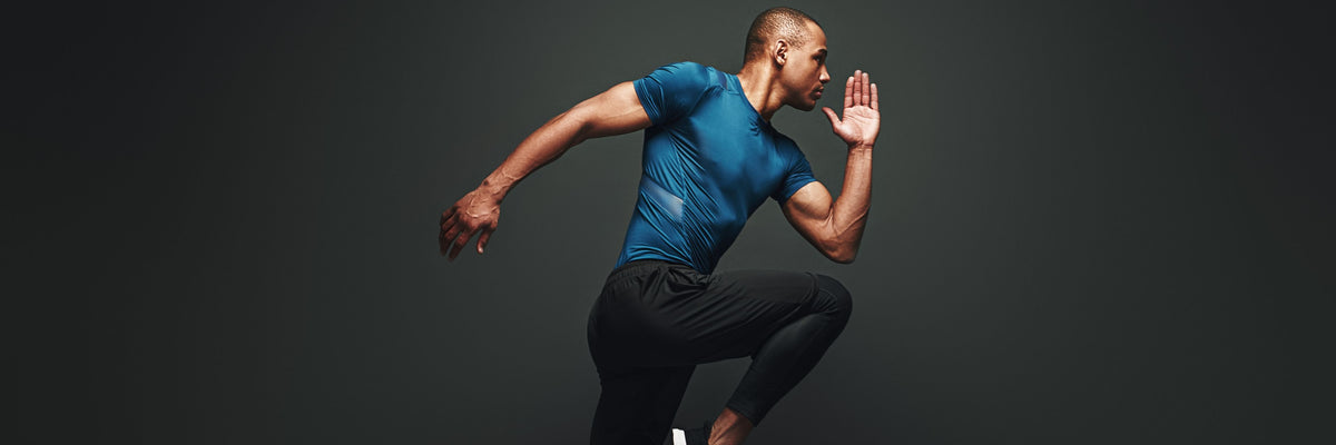 Fit male athlete sprinting