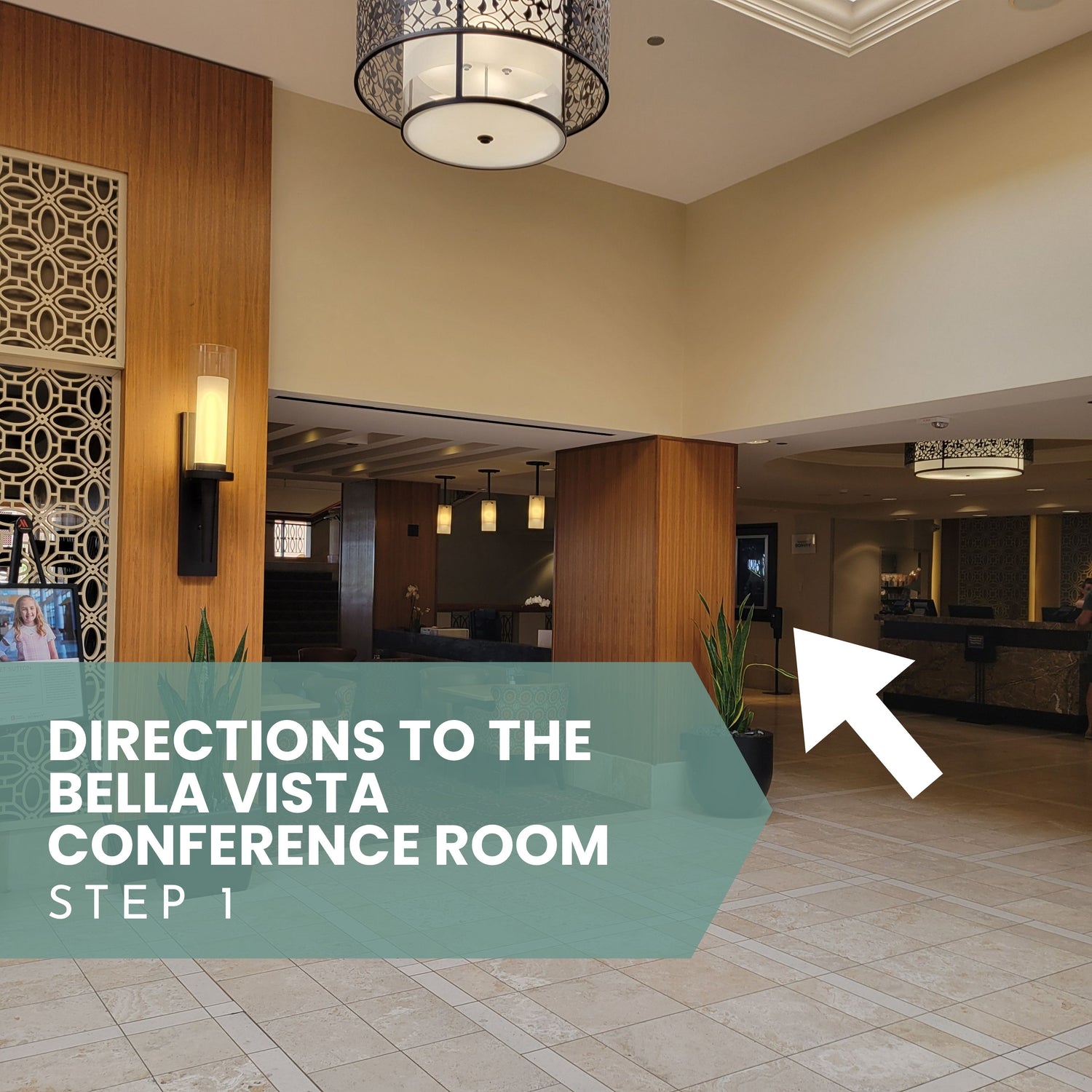Interior of a conference room with directional text and an arrow pointing towards the Bella Vista Conference Room for Sound Meditation.
