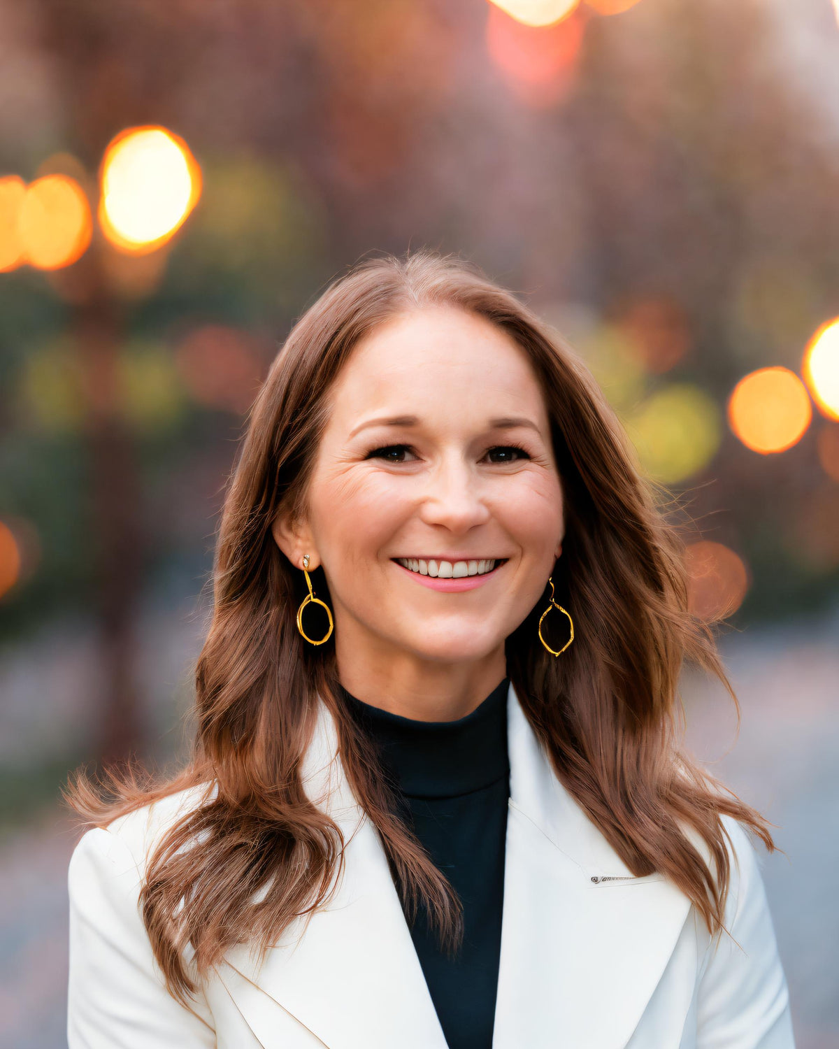 Headshot of Ascendify Wellness™  and Incendify™ founder, Liz Adriano.